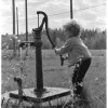 Boy pumping. The boy in the photo is Stefan Helander. (1971)